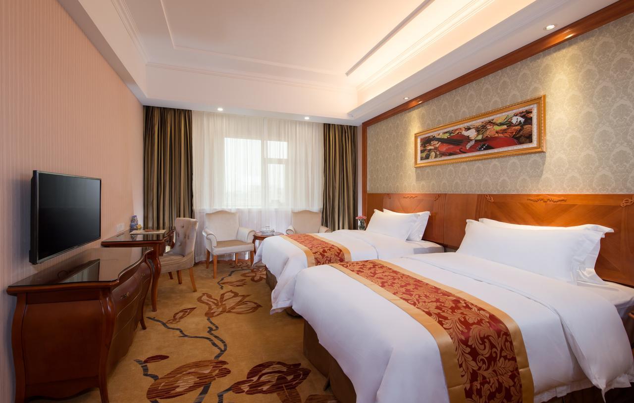 Vienna International Hotel Ningbo City Xixin Tiandi Bagian luar foto