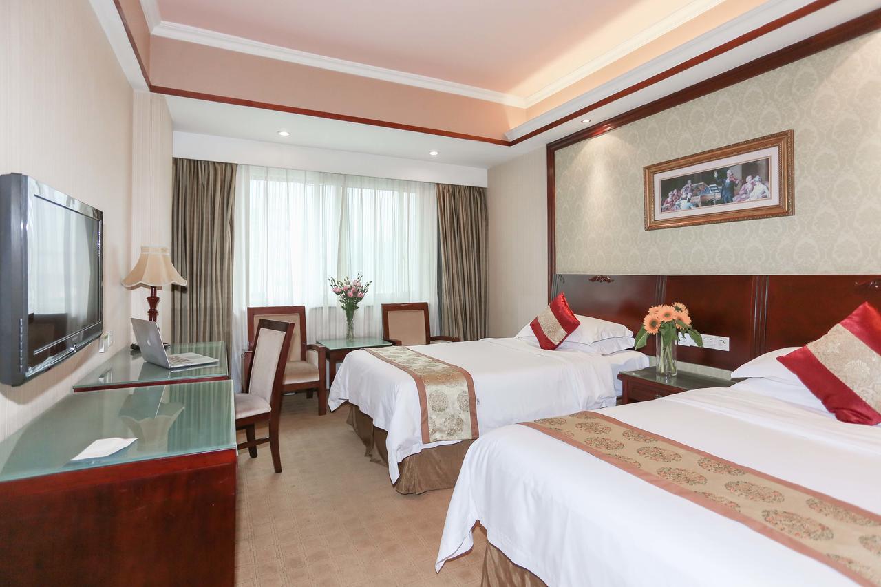 Vienna International Hotel Ningbo City Xixin Tiandi Bagian luar foto